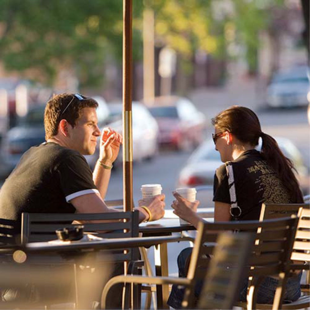 Students drinking coffee outside