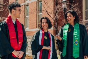 International students model stoles from their home countries