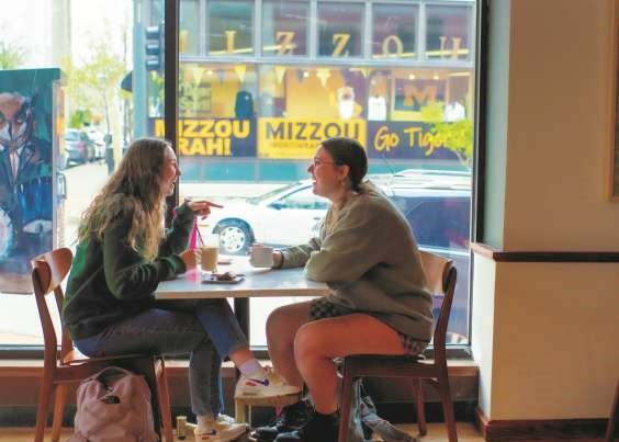 Students sitting in coffee shop