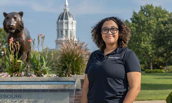 Female standing on University of Missouri campus